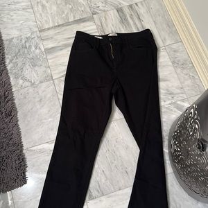 Black jeans, size 12. Never worn